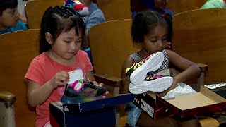 Students in Boston given free sneakers [upl. by Teece511]