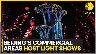 Beijings Commercial Areas Host Light Shows  Latest English News  WION [upl. by Anialed]