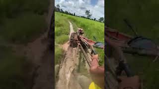 Drive a mini tractor Kubota zt140 plus to the rice fields through the muddy roadkubota [upl. by Tacy]