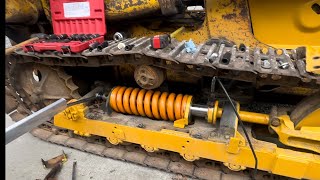 CAT Track Loader Recoil Spring Adjuster Install [upl. by Donovan]