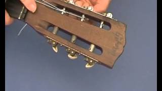 Changing strings on a Nylon String Guitar at the headstock  from guitarforbeginnerscom [upl. by Selegna]