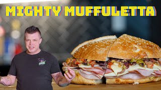 How to Make the Perfect Muffuletta  Mighty Muffuletta Sandwich  New Orleans Recipes [upl. by Hanley]