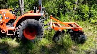 Landpride disc harrow on unbroken ground Kubota L2501 [upl. by Gottfried326]