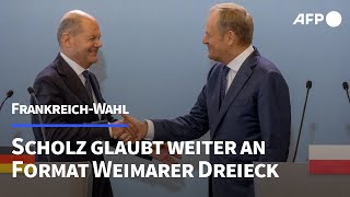 Scholz Deutschland Frankreich und Polen werden weiter gut zusammenarbeiten  AFP [upl. by Ynoyrb210]