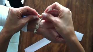 How to tie a Cruciani Bracelet [upl. by Osrock]