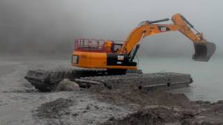 EIK AM350 Amphibious Excavator Action in Grasberg The Largest Gold Mine in the World [upl. by Roscoe319]