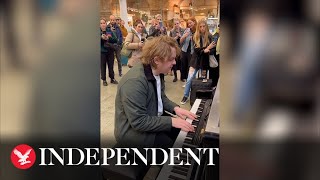 Lewis Capaldi surprises commuters by singing in London station [upl. by Floeter616]