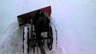 Planet Jr tuffy snow plowing drive way [upl. by Enrobialc607]