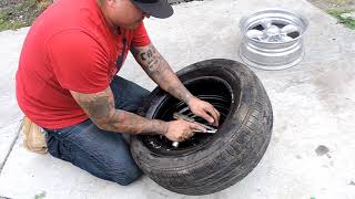 How to take a tire off the rim really easy  How to put a tire on a rim [upl. by Lafleur811]