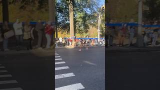 New York marathon runner runs past Central Park nyc [upl. by Ettesus]