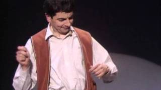 Funny Invisible Drum Kit Sketch  Rowan Atkinson Live [upl. by Eidolem]