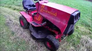 Westwood T1200 ride on mower cutting deck swap [upl. by Ardnuasak]