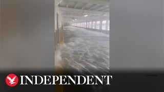 Huge waves flood ferry deck and smash against cars during Washington storm [upl. by Leoj44]