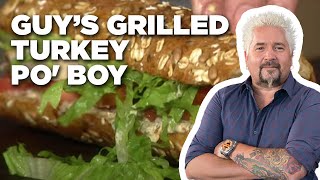 Guy Fieri Makes a Grilled Turkey Po Boy  Guys Big Bite  Food Network [upl. by Neelrahc644]