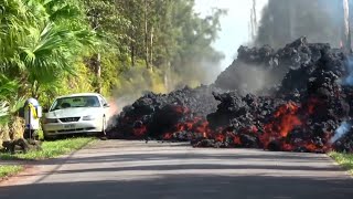 Dramatic timelapse footage shows lava engulfing car in Hawaii [upl. by Alegnave]