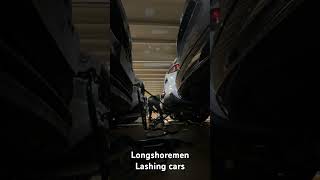 Longshoremen lashing cars putting in work portlashinglongshoremancarsbaltimore333straps [upl. by Salaidh]