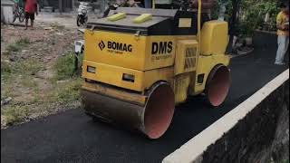 BOMAG TANDEM ROLLER COMPACTING NEW HOTMIX ROAD WAY [upl. by Naginnarb985]