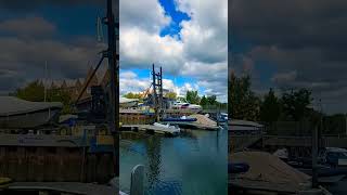 Lowering boat into the harbour Lymington New Forest boats coast hampshire uk [upl. by Naashar]