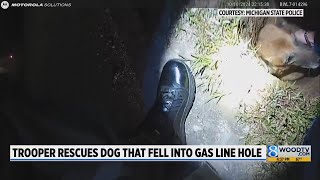 Trooper rescues dog that fell into gas line hole [upl. by Aicatsal244]