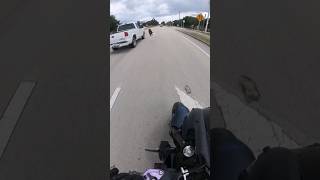 DOG JUMPS OUT OF TRUCK WINDOW IN FRONT OF BIKER PULLING INTO GAS STATION motorcycle fyp [upl. by Drofiar]