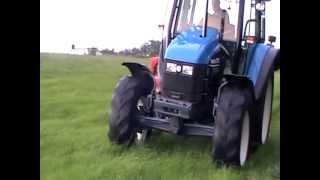 New Holland TS 110 Mowing [upl. by Trebmal941]