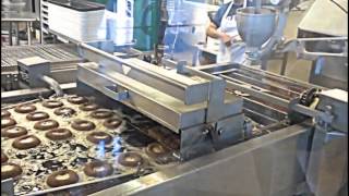 Krispy Kreme Factory Making Chocolate Glazed Donuts [upl. by Atnomed578]