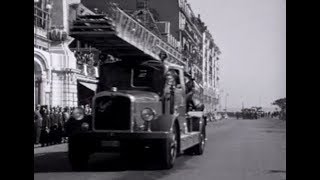 Dimanche de printemps à Genève  pompiers défilé et drapeaux 1954 [upl. by Adidnere]