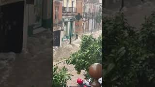 Street in Malaga is transformed into a raging torrent [upl. by Casper187]