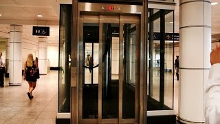 Epic Priceless amp Amazing inground hydraulic glass elevators  Montreal Trudeau Airport YUL [upl. by Lipfert667]