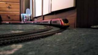 Hornby Virgin Pendolino  Tilting around a bend 9 Car unit [upl. by Cecilio]